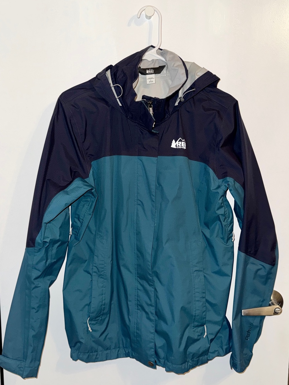 REI Women’s Teal and Navy Waterproof Hooded Rain Jacket